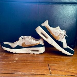 Nike Sneakers in Black and Gold